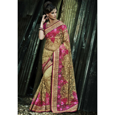 Phenomenal Beige Colored Woolen Embroidered Net Saree